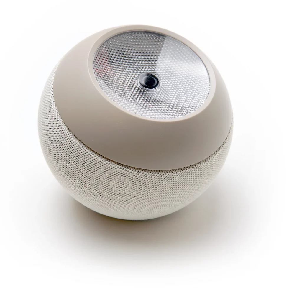 Loume Sleep Device in hellen Farben mit einem Stoff-Mesh.